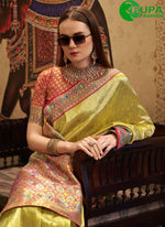 Load image into Gallery viewer, Attractive Lime Yellow Color Silk Designer traditional Wear Saree With Weaving Work