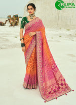 Load image into Gallery viewer, Orange and Rani Pure Georgette Bandhej, Cut Dana, Embroidered, Fancy, Hand, Moti and Zari Work Classic Saree