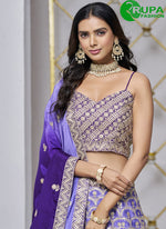 Load image into Gallery viewer, Eye Catchy Voilet Color Embroidery Work Traditional Wear Lehenga Choli