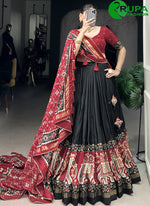 Load image into Gallery viewer, Gorgeous Black Color Tussar Silk Lehenga Choli with Patola Print Work