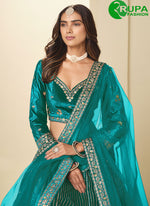 Load image into Gallery viewer, Beautiful Green Color Ice Velvet Lehenga Choli with Embroidered and Sequins Work