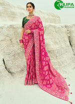 Load image into Gallery viewer, Outstanding Rani Color Pure Georgette Bandhej Saree With Cut Dana, Embroidered, Fancy Work, Moti Work And Zari Work