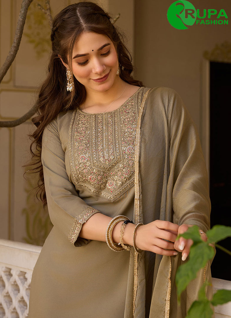 Marvelous Pista Color Rayon Embroidered and Zari Work Salwar Suit