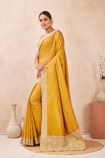 Load image into Gallery viewer, Mustard Color Silk Embroidered and Swarovski Work Trendy Designer Saree