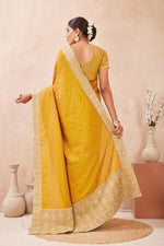 Load image into Gallery viewer, Mustard Color Silk Embroidered and Swarovski Work Trendy Designer Saree