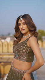 Load and play video in Gallery viewer, Mehandi Green Color Crush Lehenga Choli with Embroidered, Sequins and Thread Work